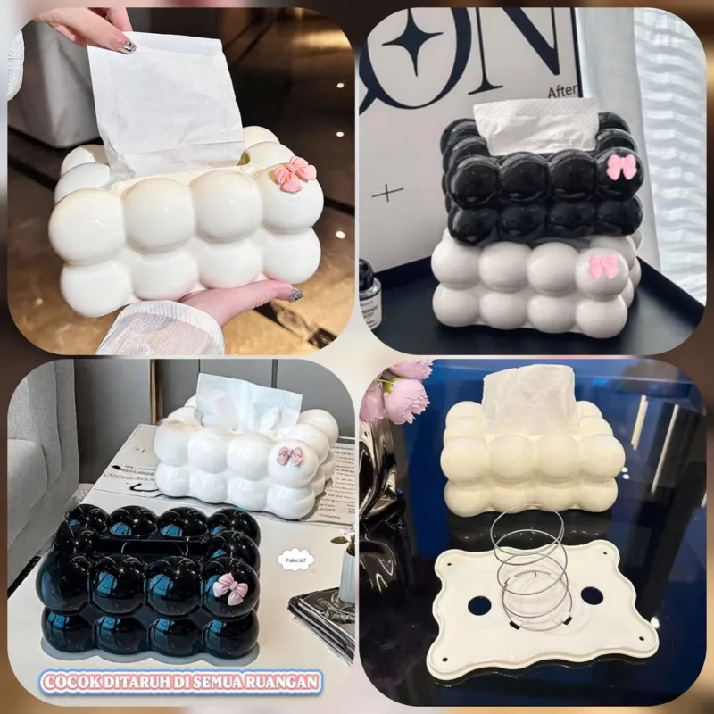 White and black Bubble Bow Tissue Box dispensers featuring bubble texture and small pink bows on tabletop surfaces.