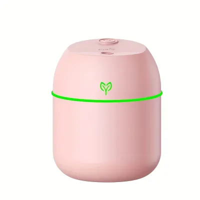 Pink Egg Humidifier with a vibrant green LED ring glowing around the middle on a white background
