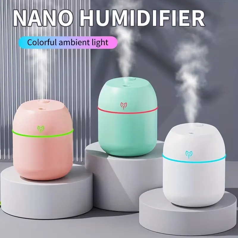 Egg Humidifier in pink, green, and white spraying fine mist on stands, showcasing colourful ambient lights